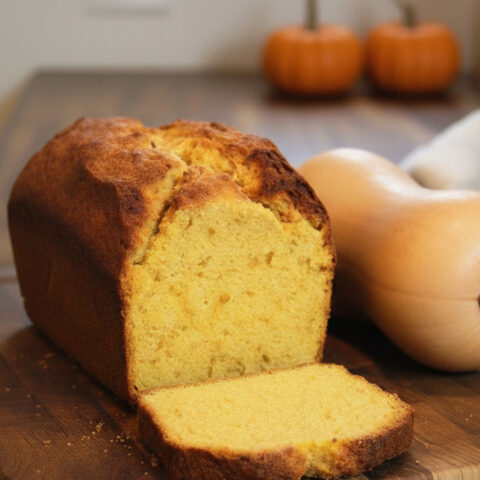 loaf of butternut squash with a butternut squash next to it