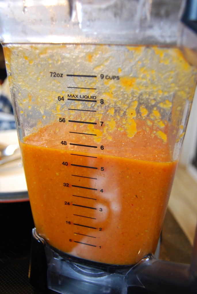 pureed tomato soup in a blender
