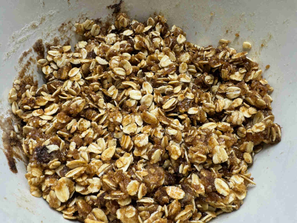 oat, brown sugar, and butter mixed together in a white bowl