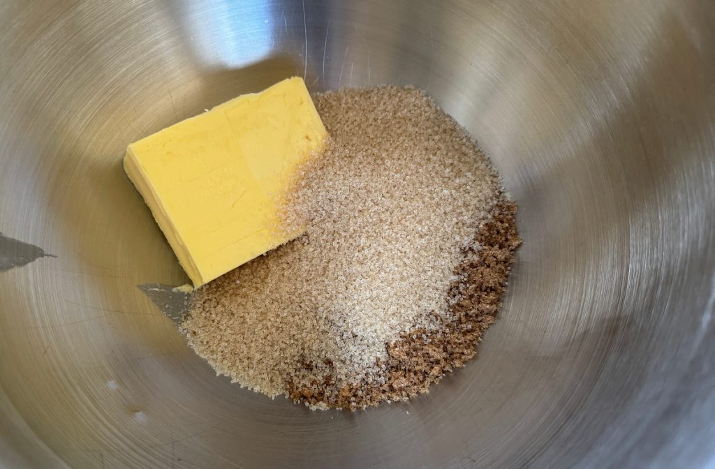 3/4 cup butter, 1/2 granulated sugar and 1/2 brown sugar in a stainless steel mixing bowl