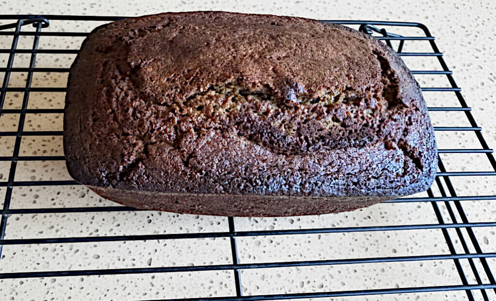 pumpkin bread with apple cider loaf on a cooling rack