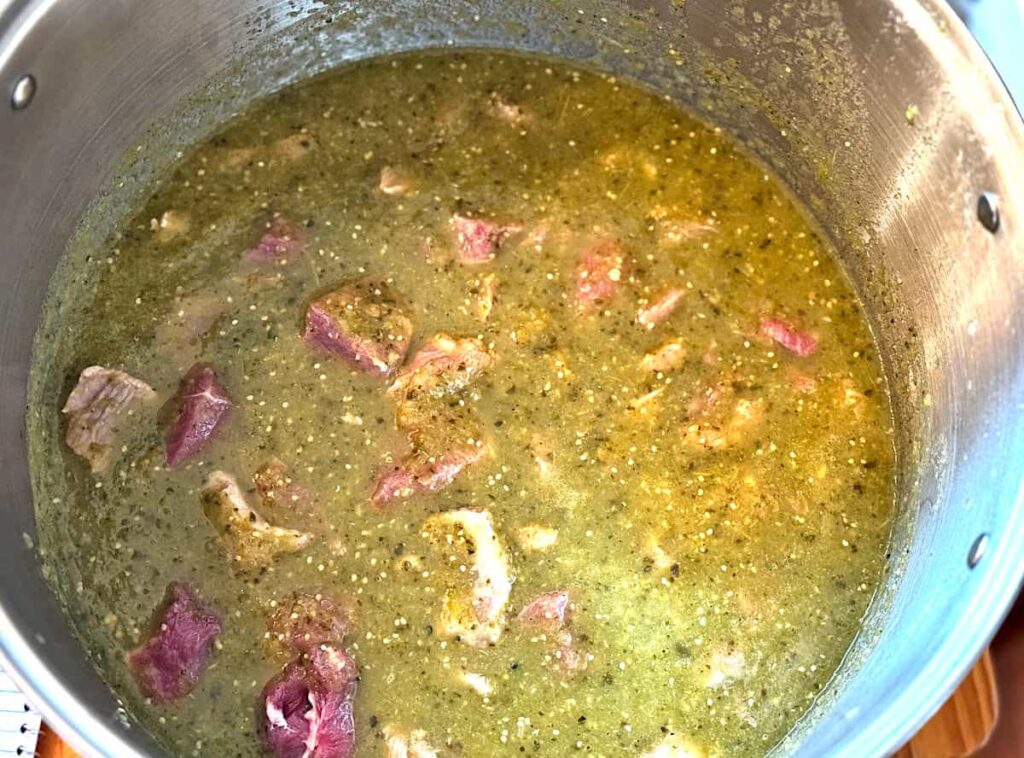 stock pot of pork chile verde before being canned